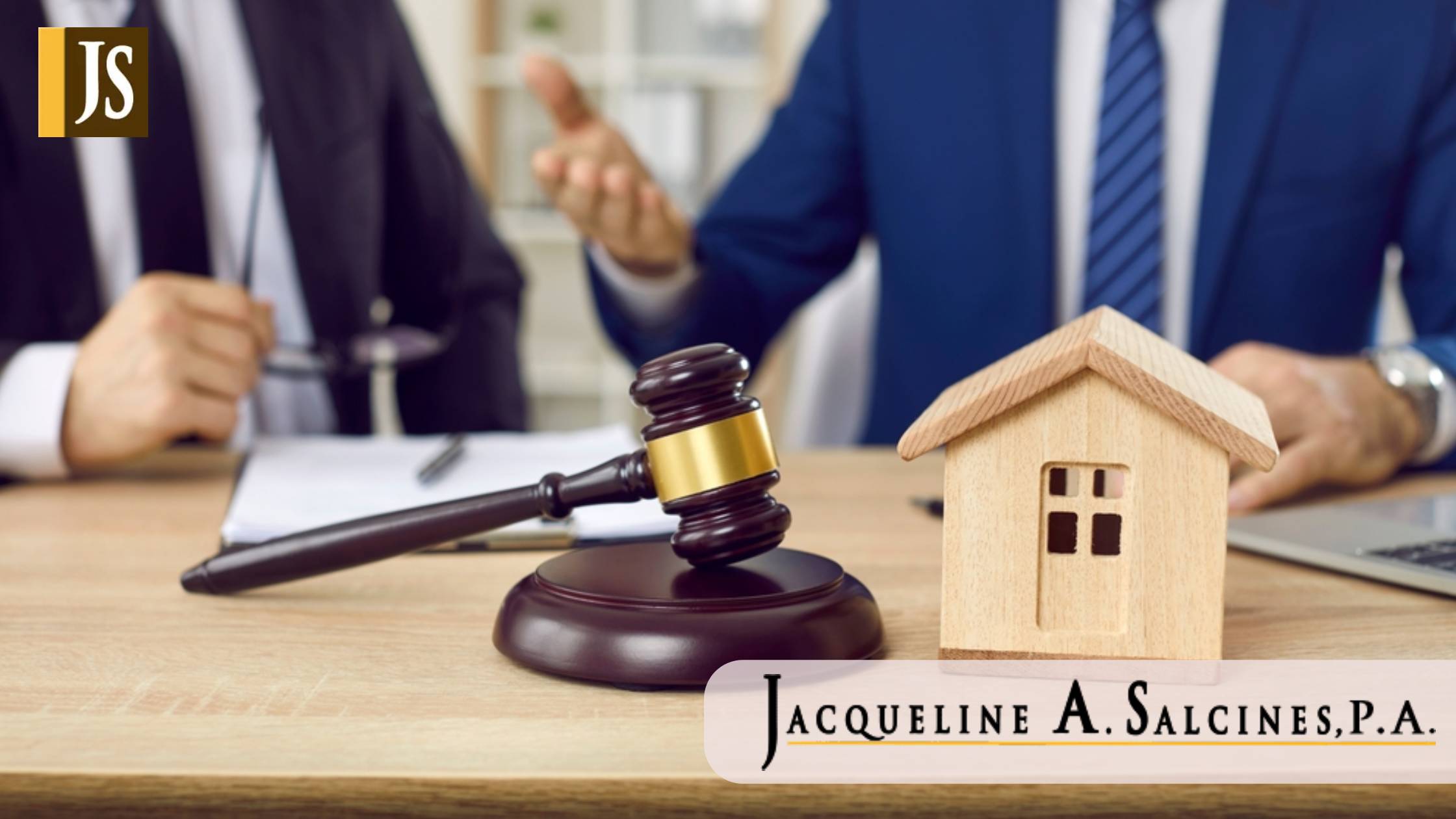 Lawyer and client make agreement of house mortgage during negotiations in office