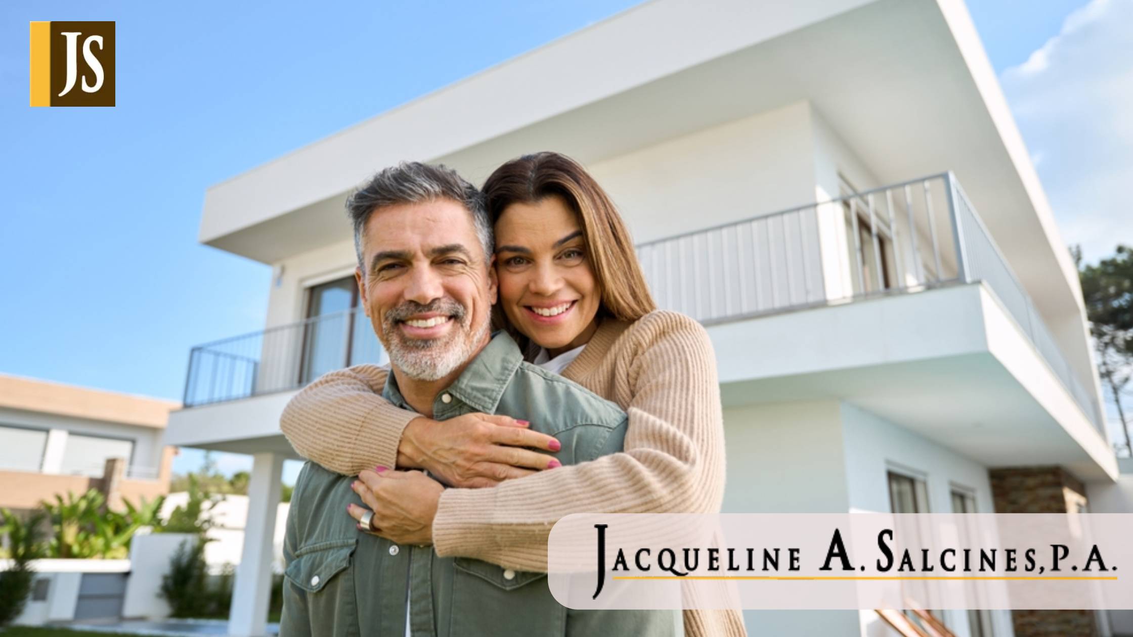 Happy smiling mature older family couple new property buyers modern dream luxury villa owners standing outside house