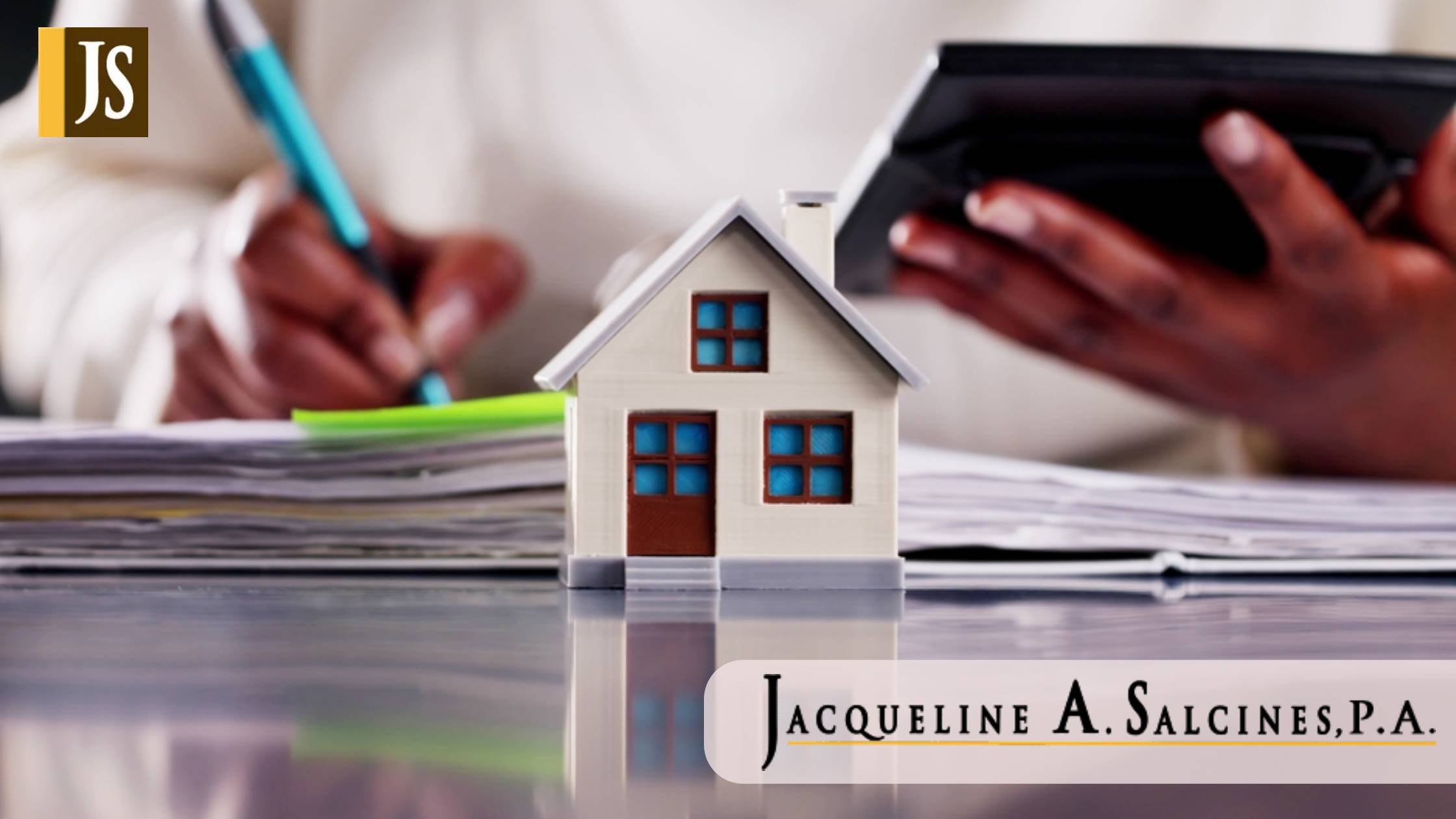 Woman Checking Real Estate Appraisal Documents for Rental Property Cost Calculation with Calculator in Hand